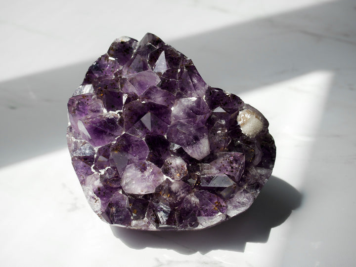 Heart-Shaped Amethyst with Golden Goethites and Sugar Calcite