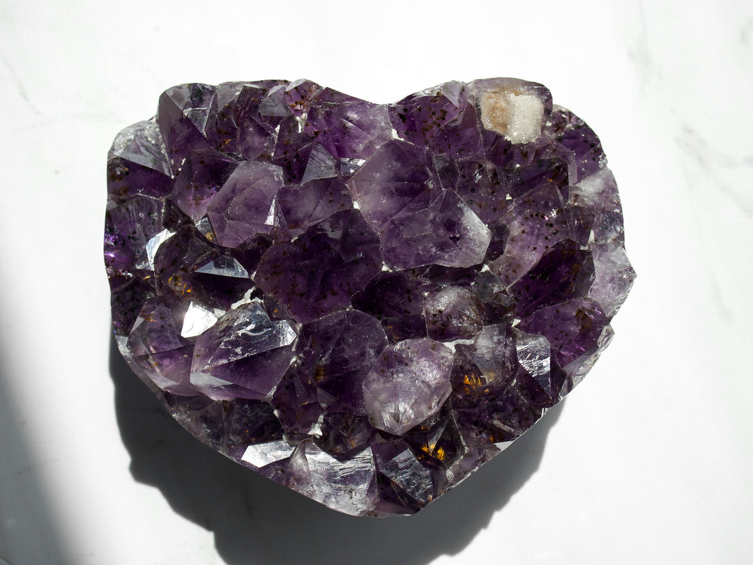 Heart-Shaped Amethyst with Golden Goethites and Sugar Calcite