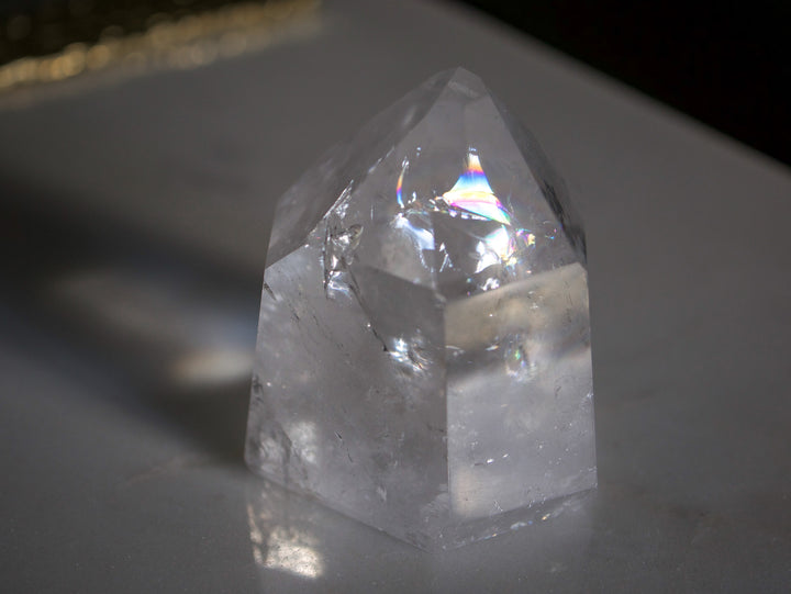 Quartz Point with Vibrant Rainbow Inclusions (Medium)