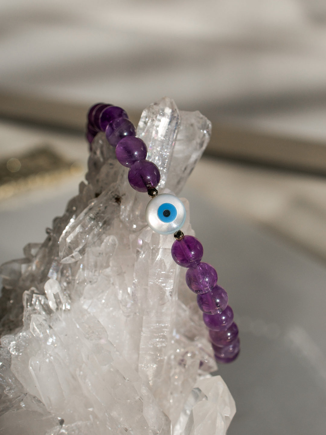 Amethyst Crystal Bracelet with Evil Eye