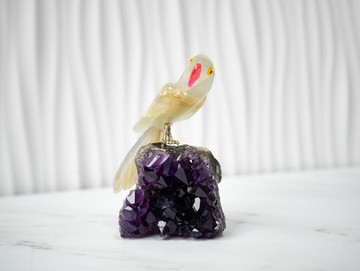 Hand-Carved Yellow Calcite and Agate Bird on Amethyst Cluster