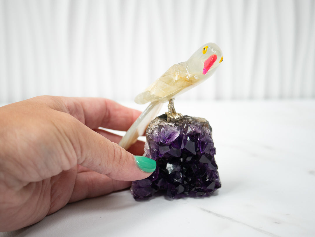 Hand-Carved Yellow Calcite and Agate Bird on Amethyst Cluster